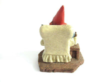 UpperDutch:Gnome,Gnome with grandchildren sitting in a chair figurine. 'Grandfather with Children' Part of the Classic Gnomes series designed by Rien Poortvliet