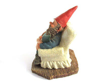 UpperDutch:Gnome,Gnome with grandchildren sitting in a chair figurine. 'Grandfather with Children' Part of the Classic Gnomes series designed by Rien Poortvliet