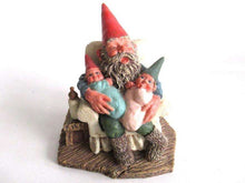 UpperDutch:,'Grandfather with Children' Gnome with grandchildren sitting in a chair figurine. Part of the Classic Gnomes series designed by Rien Poortvliet