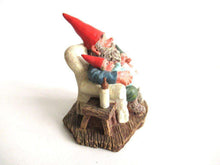 UpperDutch:,'Grandfather with Children' Gnome with grandchildren sitting in a chair figurine. Part of the Classic Gnomes series designed by Rien Poortvliet