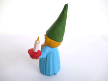 UpperDutch:Gnome,Lisa the Gnome after a design by Rien Poortvliet, Holding a candle. Blue night gown, Pajamas. BRB