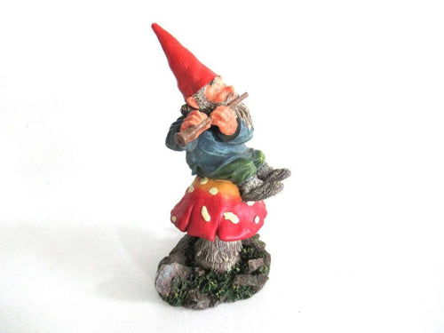 UpperDutch:Gnome,'Mo on Mushroom' after a design by Rien Poortvliet, Gnome on mushroom playing a flute. Classic Gnomes.