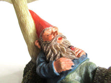 UpperDutch:,'Slumber Chief' a design by Rien Poortvliet. Gnome sleeping under a mushroom. Dutch Classic gnomes series. AAAAAAA International Co. Ltd.