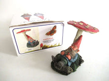 UpperDutch:,'Slumber Chief' a design by Rien Poortvliet. Gnome sleeping under a mushroom. Dutch Classic gnomes series. AAAAAAA International Co. Ltd.