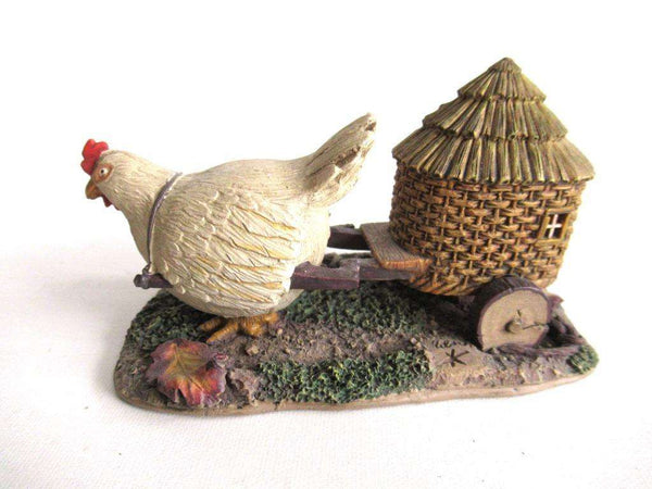 UpperDutch:,'The Sunshine Family' Gnome family with chicken camper figurine. Part of the 2000 Classic Gnomes Villages series designed by Rien Poortvliet