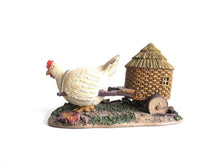 UpperDutch:,'The Sunshine Family' Gnome family with chicken camper figurine. Part of the 2000 Classic Gnomes Villages series designed by Rien Poortvliet