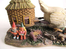 UpperDutch:,'The Sunshine Family' Gnome family with chicken camper figurine. Part of the 2000 Classic Gnomes Villages series designed by Rien Poortvliet