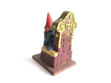 UpperDutch:,'Theodor' Gnome figurine after a design by Rien Poortvliet. Gnome on the toilet. Dutch Classic Gnomes series. AAAAAAA International Co. Ltd.