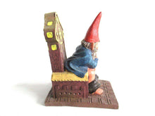 UpperDutch:,'Theodor' Gnome figurine after a design by Rien Poortvliet. Gnome on the toilet. Dutch Classic Gnomes series. AAAAAAA International Co. Ltd.
