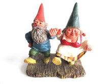 UpperDutch:,'What a Beautiful Day' Gnome figurine after a design by Rien Poortvliet. Dancing gnomes on wooden shoes. Dutch Classic Gnomes series. AAAAAAA International Co. Ltd.