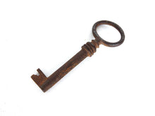 UpperDutch:Hooks and Hardware,Antique Skeleton Key. Beautiful antique metal key, skeleton key, shabby, rusty, rustic.