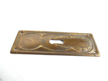 UpperDutch:Hooks and Hardware,Keyhole cover, Brass Stamped Shabby Escutcheon, keyhole plate.