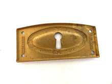 UpperDutch:Hooks and Hardware,Authentic Art Deco Keyhole cover, Stamped Escutcheon, key hole plate.