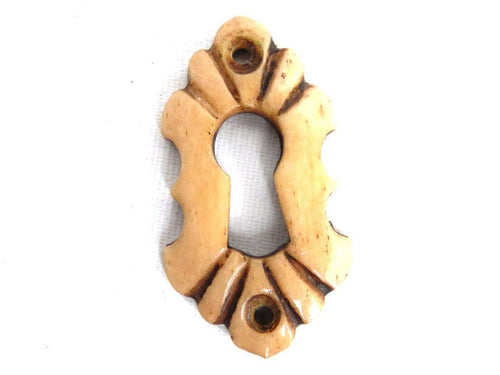 UpperDutch:Hooks and Hardware,Bone Keyhole cover, plate, bone escutcheon, keyhole frame.
