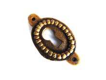 UpperDutch:Hooks and Hardware,1 (ONE) small Oval Keyhole cover, Antique brass escutcheon, key hole frame, plate.