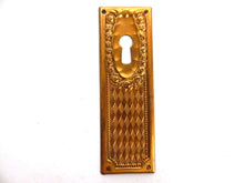 UpperDutch:Hooks and Hardware,1 (ONE) Keyhole cover, Brass Stamped Floral Escutcheon, keyhole plate, with roses.