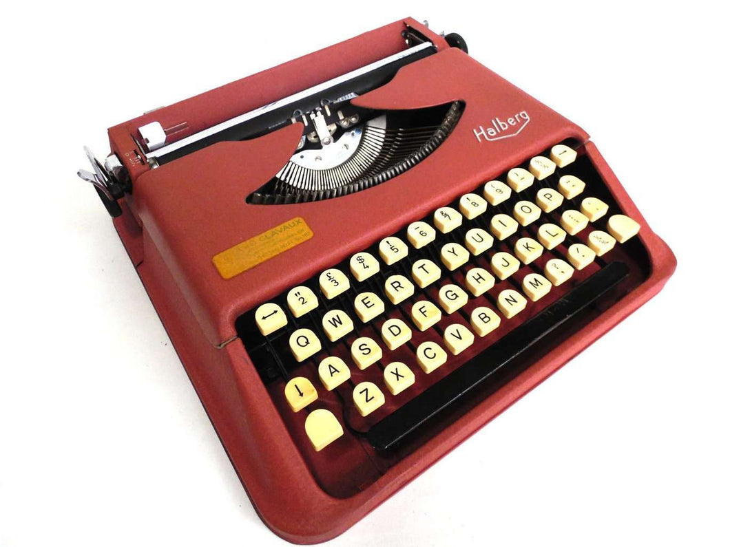 UpperDutch:Typewriter,Working Typewriter 1950's Halberg. QWERTY keyboard. 1953, rare typewriter. Portable Pink Halberg typewriter.