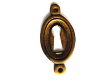 UpperDutch:Hooks and Hardware,Oval Keyhole cover, Antique brass escutcheon, key hole frame, plate.