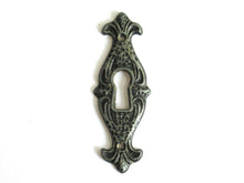 UpperDutch:Hooks and Hardware,1 Keyhole cover, vintage metal key hole frame, plate. Ornamental escutcheon, cabinet hardware. For restoration or jewelry making