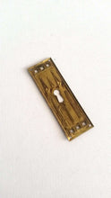 UpperDutch:Hooks and Hardware,Authentic Shabby antique Art Deco Keyhole cover, Stamped Escutcheon, keyhole plate.