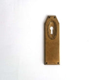 UpperDutch:Hooks and Hardware,1 Keyhole Escutcheon metal Keyhole cover, stamped key hole frame, stamping plate.