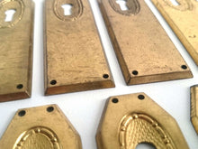 UpperDutch:Hooks and Hardware,1 Keyhole Escutcheon metal Keyhole cover, stamped key hole frame, stamping plate.