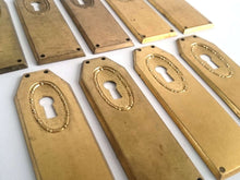UpperDutch:Hooks and Hardware,1 Keyhole Escutcheon metal Keyhole cover, stamped key hole frame, stamping plate.