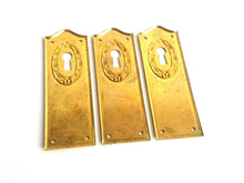UpperDutch:Hooks and Hardware,1 Keyhole Escutcheon metal Keyhole cover, stamped keyhole frame, stamping plate.