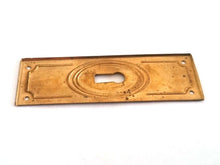 UpperDutch:Hooks and Hardware,Stamped brass keyhole escutcheon, vintage keyhole cover, keyhole plate. Restoration hardware, shabby furniture hardware.