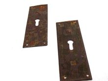 UpperDutch:Hooks and Hardware,Set of 2 Rusty key hole plates, stamped escutcheon with authentic rustic patina. Distressed keyhole covers with rust. Hardware