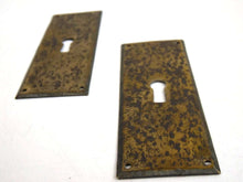 UpperDutch:Hooks and Hardware,Set of 2 Rusty antique keyhole covers, stamped escutcheon with authentic patina, with loads of character for your furniture.