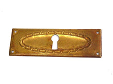 UpperDutch:Hooks and Hardware,Keyhole cover, old stamped escutcheon with an authentic patina. Cabinet hardware