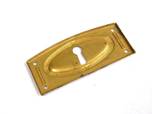 UpperDutch:Hooks and Hardware,Authentic Art Deco Keyhole cover, Stamped Escutcheon, keyhole plate.