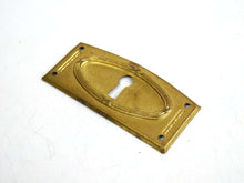 UpperDutch:Hooks and Hardware,Authentic Art Deco Keyhole cover, Stamped Escutcheon, keyhole plate.