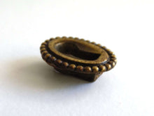 UpperDutch:Hooks and Hardware,1 Vintage small oval keyhole cover. Cast brass escutcheon for jewelry making, furniture decoration. Distressed hardware.