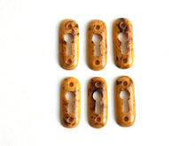 UpperDutch:Hooks and Hardware,1 Vintage Keyhole cover plastic rounded escutcheon keyhole frame / plate. marbled brown