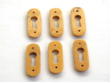 UpperDutch:Hooks and Hardware,1 Vintage Keyhole cover plastic rounded escutcheon keyhole frame / plate. marbled brown