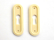 UpperDutch:Hooks and Hardware,1 Vintage Keyhole cover plastic rounded escutcheon keyhole frame / plate.
