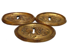 UpperDutch:Hooks and Hardware,Set of 3 Brass Antique Keyhole covers. Antique Stamped, pressed Brass, Copper Ornament. Brass furniture applique.