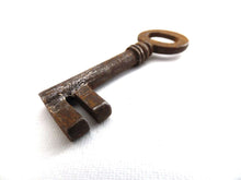 UpperDutch:Hooks and Hardware,Antique Skeleton Key. Beautiful antique metal key, skeleton key,shabby, rusty, rustic.