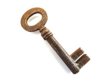 UpperDutch:Hooks and Hardware,Antique Skeleton Key. Beautiful antique metal key, skeleton key,shabby, rusty, rustic.