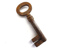 UpperDutch:Hooks and Hardware,Antique Skeleton Key. Beautiful antique metal key, skeleton key,shabby, rusty, rustic.