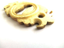 UpperDutch:Keyhole cover,1 (ONE) Bone Keyhole cover, plate, bone escutcheon, keyhole frame.
