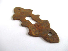 UpperDutch:,1 (One) Rusty keyhole cover, frame, metal Escutcheon