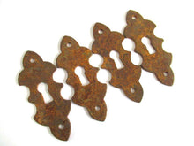 UpperDutch:,1 (One) Rusty keyhole cover, frame, metal Escutcheon