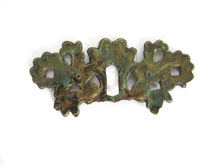 UpperDutch:,Antique Brass Keyhole cover, escutcheon. Shabby / distressed keyhole frame plate, floral. Furniture hardware.