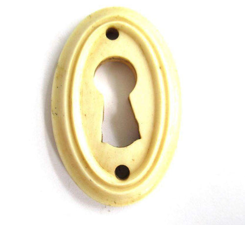 UpperDutch:Keyhole cover,Bone Keyhole cover, plate, bone escutcheon, keyhole frame.