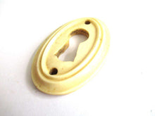 UpperDutch:Keyhole cover,Bone Keyhole cover, plate, bone escutcheon, keyhole frame.