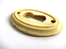 UpperDutch:Keyhole cover,Bone Keyhole cover, plate, bone escutcheon, keyhole frame.