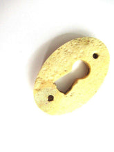 UpperDutch:Keyhole cover,Bone Keyhole cover, plate, bone escutcheon, keyhole frame.